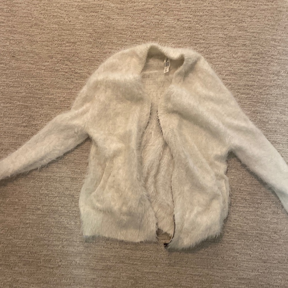 Fuzzy sweater with a zipper